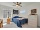 Bedroom with natural light featuring modern furniture and bright windows at 24555 E Ohio Dr, Aurora, CO 80018