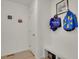 Entryway featuring a white bench, storage cubbies, and convenient coat hooks at 24555 E Ohio Dr, Aurora, CO 80018