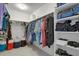 Walk-in closet with ample storage and shelving at 24555 E Ohio Dr, Aurora, CO 80018