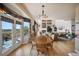 Dining area with large windows offering scenic views at 10520 W Vassar Dr, Denver, CO 80227