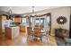 Spacious kitchen with island and wooden cabinetry at 10520 W Vassar Dr, Denver, CO 80227