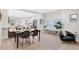 Modern dining area with black chairs and a wooden table at 7204 W 26Th Ave, Lakewood, CO 80214