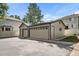 Attached three-car garage with ample parking space at 7204 W 26Th Ave, Lakewood, CO 80214