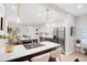 Bright, updated kitchen with a center island, modern appliances, and an adjacent breakfast nook at 7204 W 26Th Ave, Lakewood, CO 80214