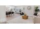 Open concept living room and dining area with hardwood floors and modern decor at 7204 W 26Th Ave, Lakewood, CO 80214