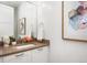 Elegant bathroom features double sinks, white cabinetry, and stylish vanity at 2114 Lowell Blvd, Denver, CO 80211