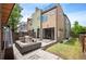 Modern home featuring a landscaped backyard with patio and barbecue area at 2114 Lowell Blvd, Denver, CO 80211