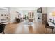 Open-concept living room boasts hardwood floors, large windows, and contemporary decor at 2114 Lowell Blvd, Denver, CO 80211