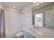 Cozy bathroom featuring a combined shower and tub with modern fixtures and updated vanity at 12225 W 57Th Pl, Arvada, CO 80002