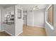 Dining area featuring neutral walls, wood floors, ceiling fan, and access to the kitchen at 13633 E Yale Ave # B, Aurora, CO 80014