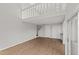 Bright living room with wood-look flooring and white trim at 13633 E Yale Ave # B, Aurora, CO 80014