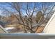Expansive view from patio, perfect for enjoying the beautiful scenery and tranquil neighborhood atmosphere at 13633 E Yale Ave # B, Aurora, CO 80014