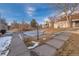 A charming community pond is surrounded by walkways and landscaping, offering a serene outdoor space for residents at 13633 E Yale Ave # B, Aurora, CO 80014