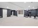 Finished basement area with an exercise area, and neutral carpet at 3566 E Meadow Creek Pl, Highlands Ranch, CO 80126