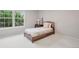 Bright bedroom with a large window and neutral walls offering a serene atmosphere at 3566 E Meadow Creek Pl, Highlands Ranch, CO 80126