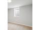 Cozy bedroom with carpet flooring, light wall paint, and a view through the window at 2784 E Maplewood Ave, Centennial, CO 80121