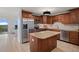 The kitchen is complete with stainless steel appliances, granite counters, and an island at 44 S Holman Way, Golden, CO 80401