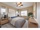 Comfortable bedroom with neutral walls, plush bedding, and bright natural light, creating a serene atmosphere at 5190 Ditmars Trl, Castle Rock, CO 80104