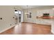 Bright breakfast nook with sliding glass doors leading to the outside, adjacent to the kitchen at 5190 Ditmars Trl, Castle Rock, CO 80104