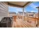 Spacious wooden deck overlooking the neighborhood, ideal for outdoor dining and grilling at 5190 Ditmars Trl, Castle Rock, CO 80104
