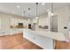 Gourmet kitchen with a large center island, ample cabinet space, and modern appliances at 5190 Ditmars Trl, Castle Rock, CO 80104