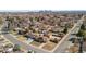 Panoramic aerial shot showcasing a suburban neighborhood with lush greenery, diverse homes, and tree lined streets at 96 S Depew Dr, Lakewood, CO 80226