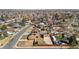A sprawling neighborhood with single Gathering homes, mature trees, and well maintained yards under a clear sky at 96 S Depew Dr, Lakewood, CO 80226