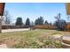 A expansive backyard featuring a mix of green lawn and open space, perfect for outdoor activities and recreation at 96 S Depew Dr, Lakewood, CO 80226