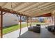 Enjoy the outdoors on this covered patio that overlooks a green lawn, with space for recreation and relaxation at 96 S Depew Dr, Lakewood, CO 80226