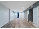 Finished basement features stylish flooring, recessed lighting, and an open layout, perfect for recreation at 96 S Depew Dr, Lakewood, CO 80226