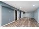 Spacious basement featuring finished floors, recessed lights, and neutral paint, offering versatile living space at 96 S Depew Dr, Lakewood, CO 80226