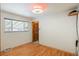 Clean bedroom with hardwood floors, and a ceiling fan at 96 S Depew Dr, Lakewood, CO 80226
