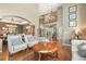 Open foyer with staircase, hardwood floors, and high ceilings at 907 Greenridge Ln, Castle Pines, CO 80108