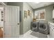 Laundry room featuring new washer and dryer, storage, and tile floor at 907 Greenridge Ln, Castle Pines, CO 80108