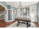 Beautiful home office with custom built-ins, hardwood floors, and a large desk at 907 Greenridge Ln, Castle Pines, CO 80108