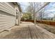 Large wooden deck perfect for entertaining or relaxing in the backyard with pergola frame at 16434 Homestead Ct, Parker, CO 80134