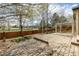 Spacious wooden deck with views of the surrounding yard and mature trees at 16434 Homestead Ct, Parker, CO 80134