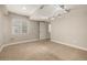 Carpeted bedroom with recessed lighting and a large window at 16434 Homestead Ct, Parker, CO 80134