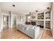 Spacious living room with hardwood floors, fireplace, and open layout for easy entertainment at 16434 Homestead Ct, Parker, CO 80134