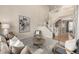Spacious living room showcasing a staircase, stylish decor, and neutral paint at 16434 Homestead Ct, Parker, CO 80134