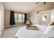 Bright main bedroom with vaulted ceiling, carpet and seating area at 16434 Homestead Ct, Parker, CO 80134