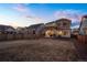 Large fenced backyard with a covered patio, perfect for Gathering gatherings and outdoor activities at 26322 E 2Nd Ave, Aurora, CO 80018
