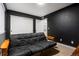 Dark painted bedroom with carpet and closet at 26322 E 2Nd Ave, Aurora, CO 80018