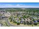 Residential aerial view featuring tree-lined streets and a well-maintained neighborhood close to shopping and recreation at 11575 Wilson Cir, Parker, CO 80134