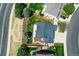 Stunning aerial view showcases a well-maintained home with mature trees, landscaping, and a private backyard at 11575 Wilson Cir, Parker, CO 80134