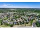 Attractive neighborhood aerial view with single-Gathering homes, lush greenery, and winding roads close to city amenities at 11575 Wilson Cir, Parker, CO 80134