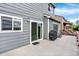 Exterior view of spacious deck with a sliding glass door, grill, and outdoor seating area at 11575 Wilson Cir, Parker, CO 80134
