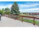 Large wooden deck provides a great view of neighborhood landscaping and scenery at 11575 Wilson Cir, Parker, CO 80134