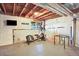 Unfinished basement with fitness equipment and TV, ready to be designed to suit your needs at 11575 Wilson Cir, Parker, CO 80134