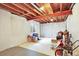 Unfinished basement with exposed beams, ready for your custom design at 11575 Wilson Cir, Parker, CO 80134